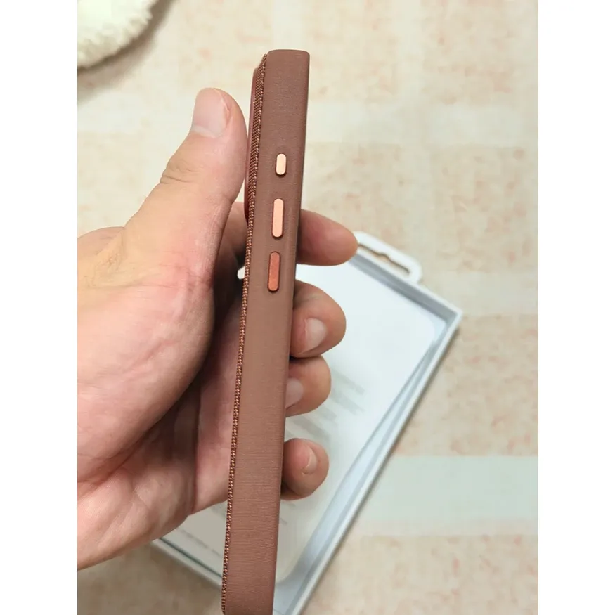 iPhone 17 Pro TechWoven Case with MagSafe in brown with premium woven texture and raised camera protection.