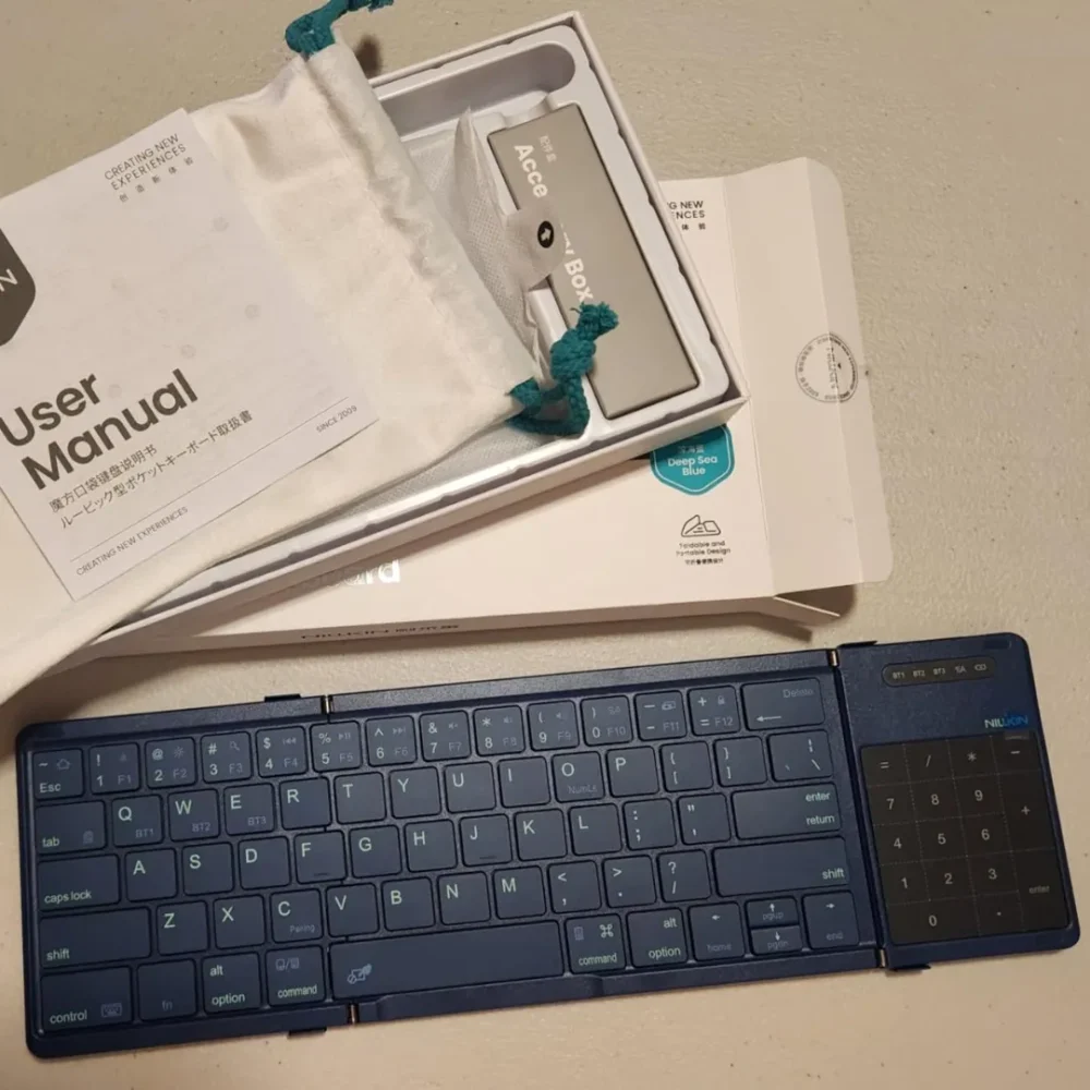 Nillkin Cube Foldable Bluetooth Keyboard with Touchpad & Number Pad for iPad, Laptop & Phone | Multi-Device Wireless Keyboard Nillkin Cube Foldable Bluetooth Keyboard with Touchpad & Number Pad for iPad, Laptop & Phone | Multi-Device Wireless Keyboard